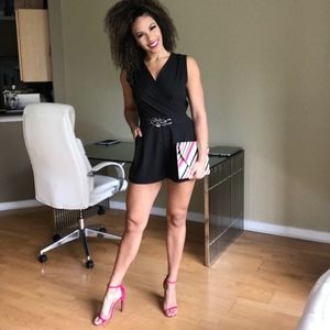 Black Romper with pockets and Key Hole back